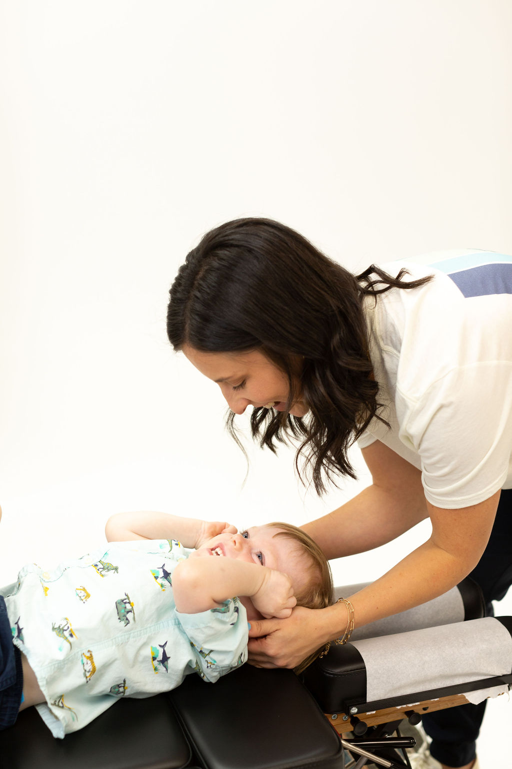 Dr Jessica and smiling kid - Lighthouse Chiropractic and Wellness