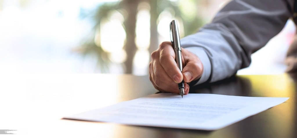 Doctor writing on a sheet